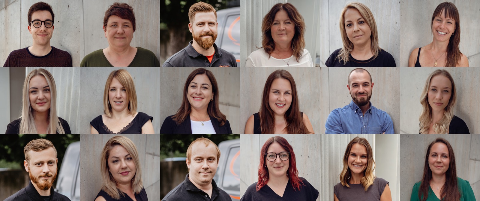 Porträtwand des D.T.NET-Service-Teams: 18 Mitarbeiterinnen und Mitarbeiter